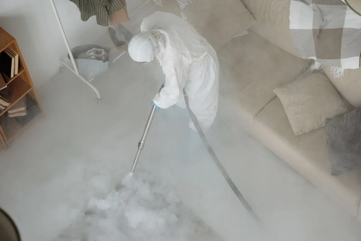 Biohazard cleanup technician in protective equipment, Mount Tabor, NJ